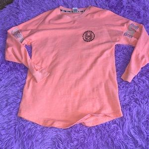 Victoria’s Secret PINK long sleeve shirt. Coral color black lettering. Size XS